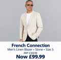 A man wearing a light beige linen blazer over a white t-shirt and dark trousers, shown against a gray background with a promotional text banner for 'French Connection' at the bottom.